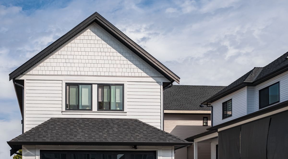 Minneapolis neighborhood homes showing 5-inch K-style gutters on typical residential roofs