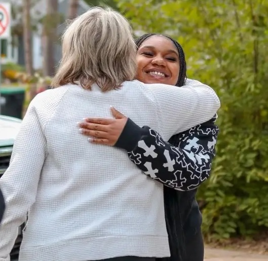women hugging