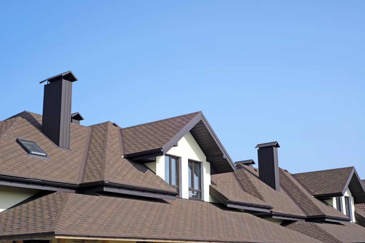 Minneapolis home with K-style gutters along the eaves — the standard residential profile for most Minnesota homes